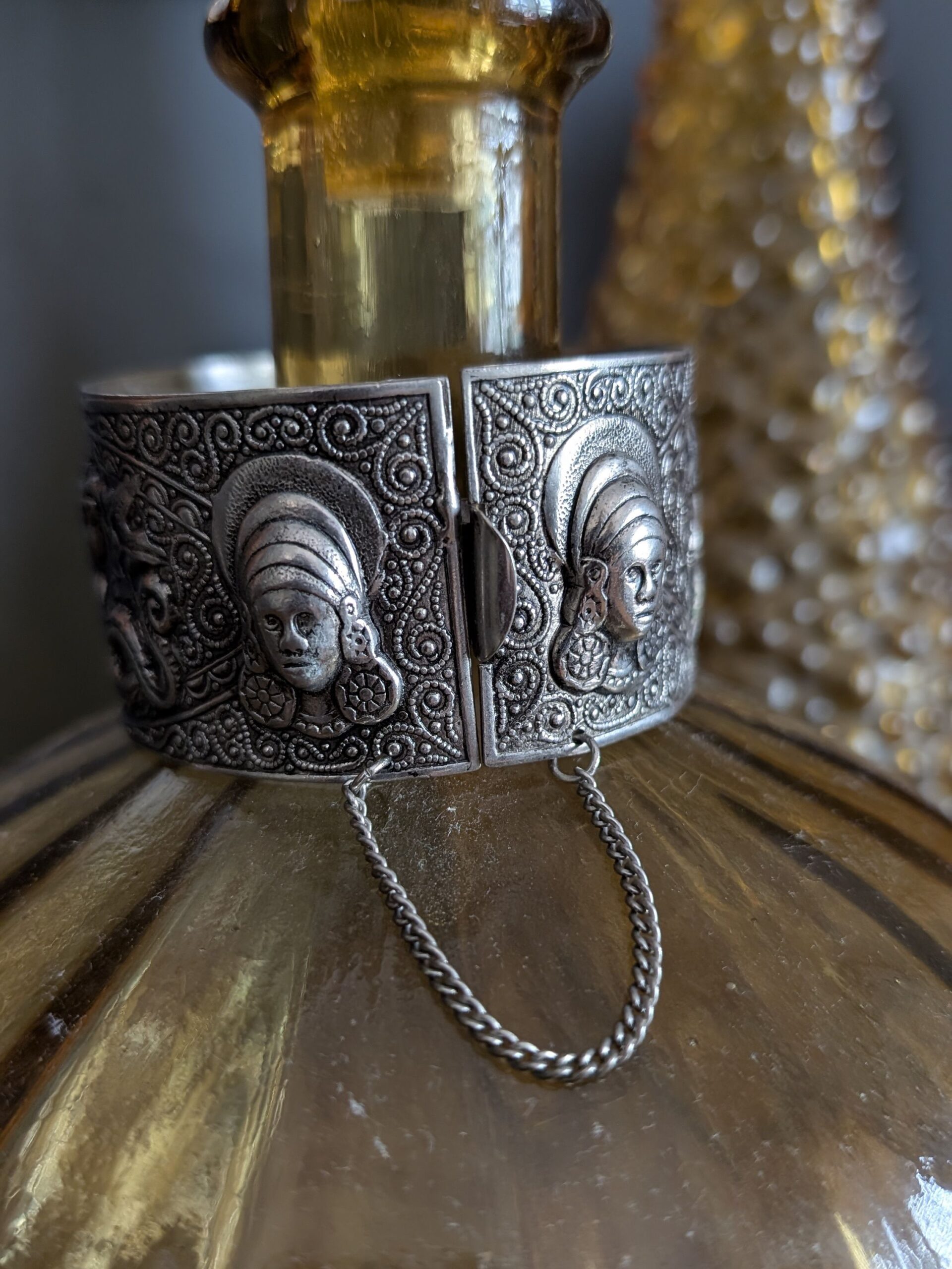 Vintage Silver Bracelet with Decorative Faces