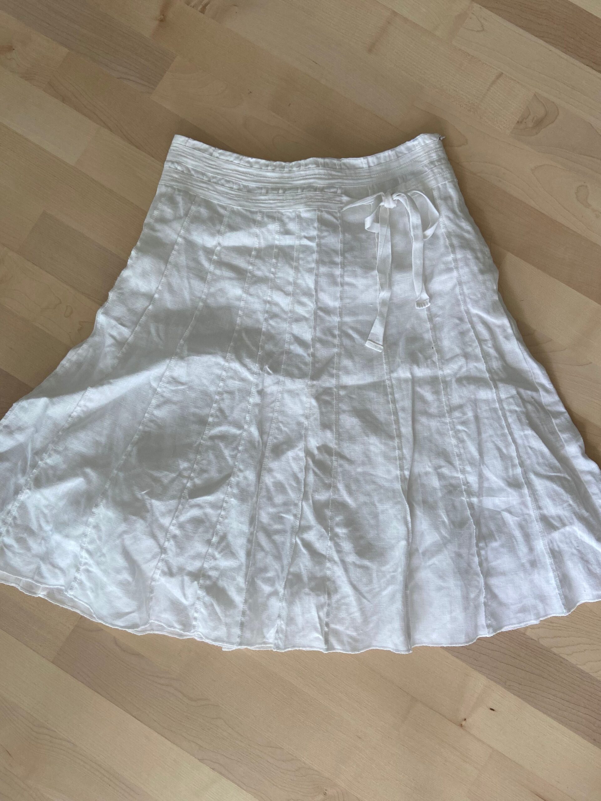 Women’s White Pleated Skirt with Side Tie Detail