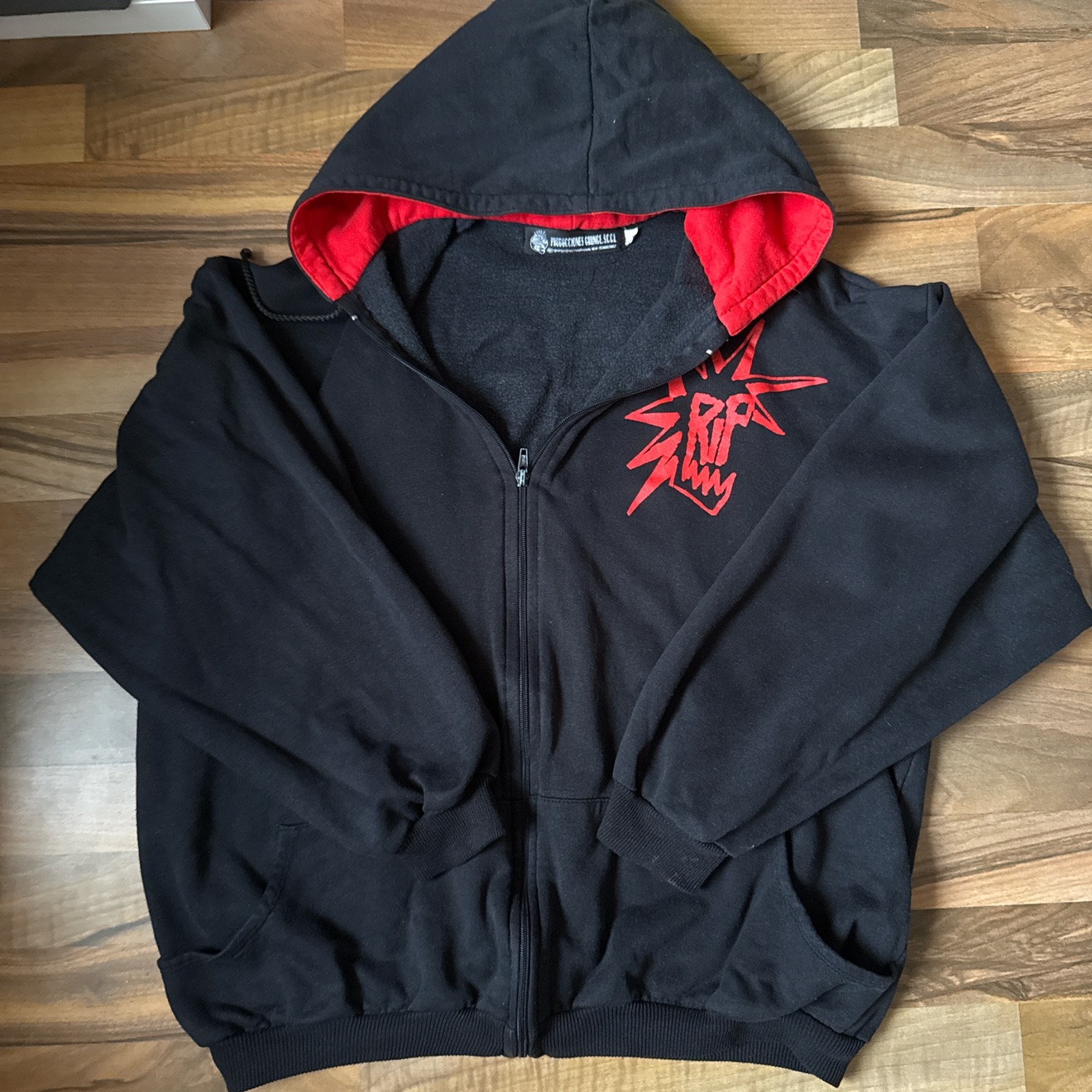 Black Zip-Up Hoodie with Red Lining & Graphic Design