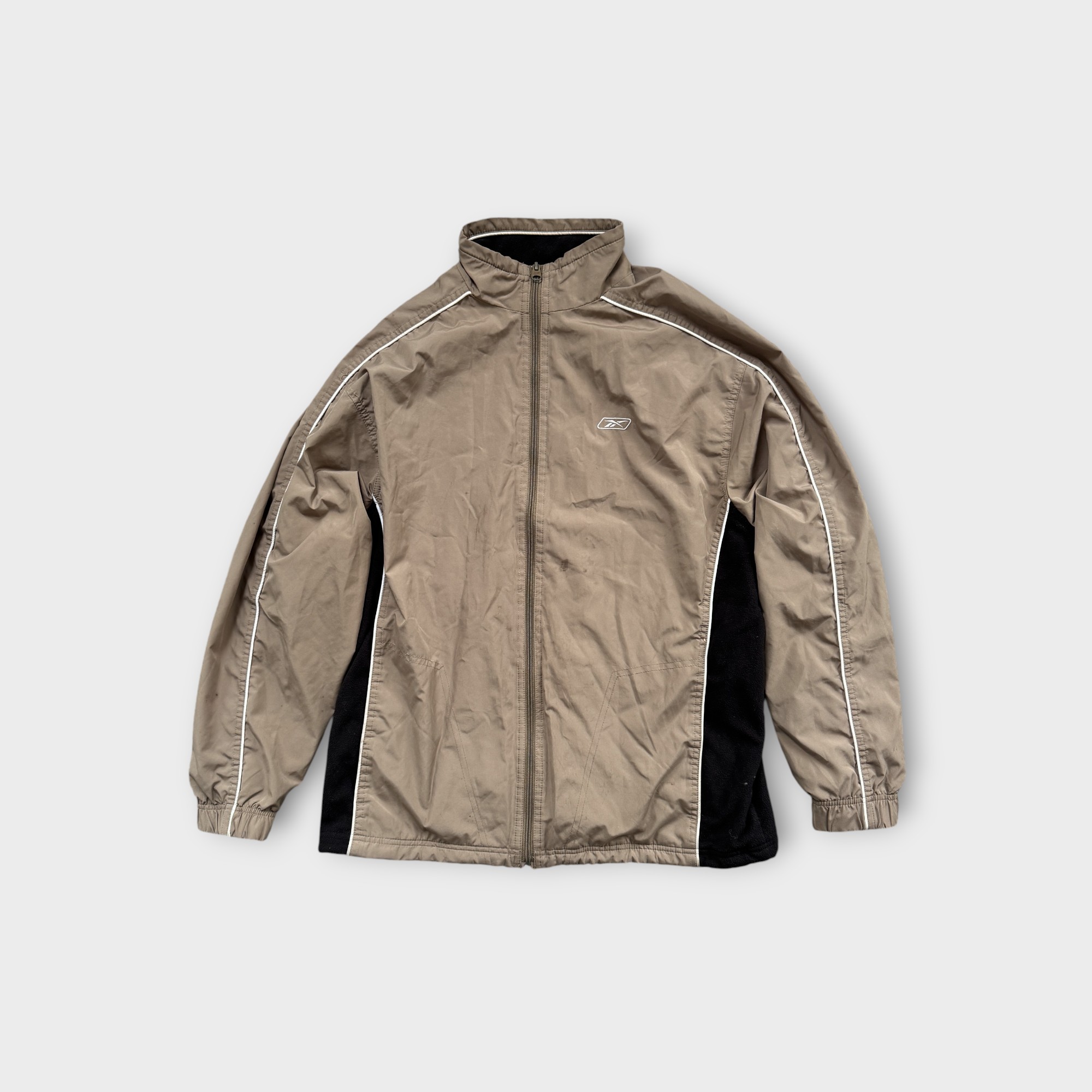 Beige Reebok Windbreaker Jacket with Black Panels and White Piping