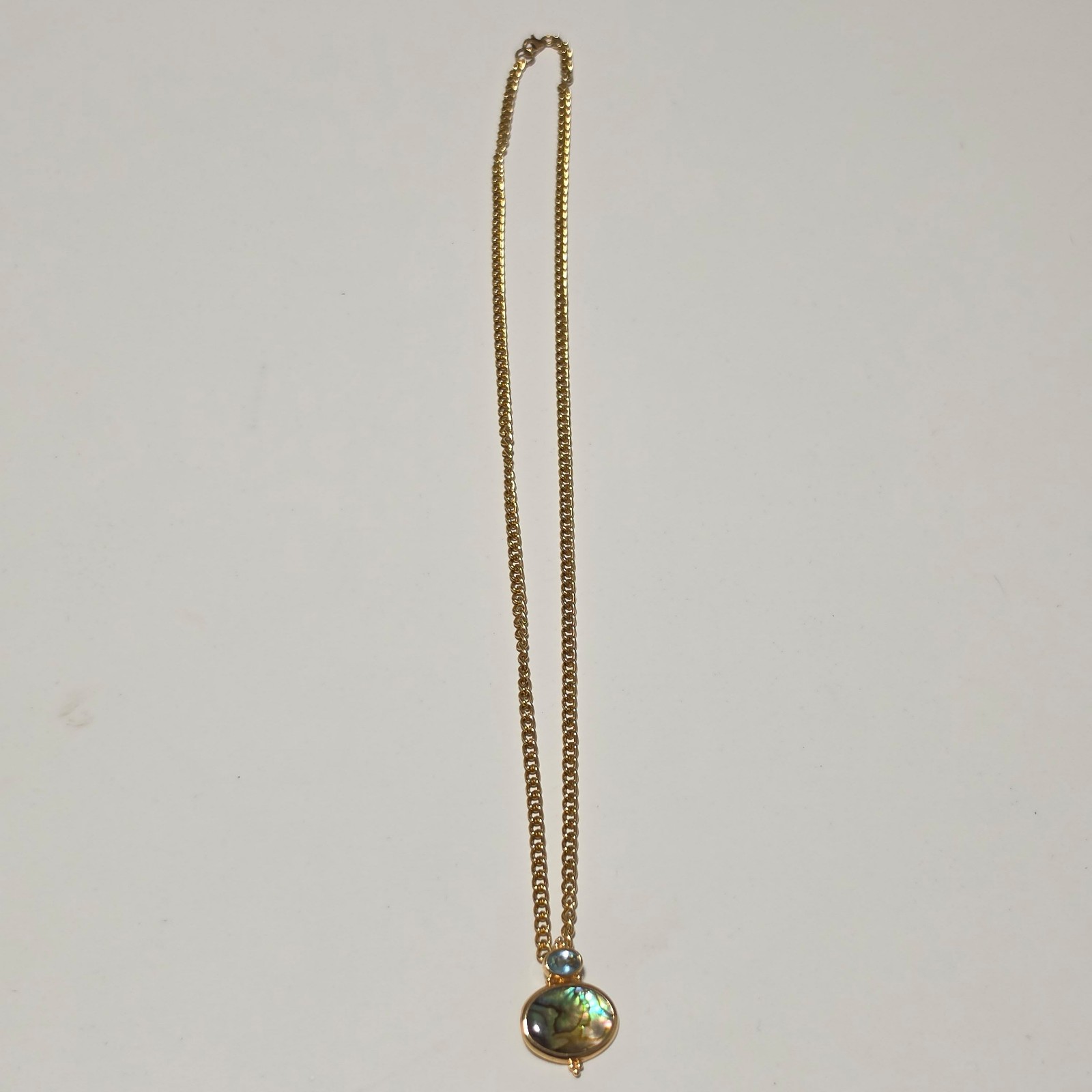 Costume Gold Tone Pendant Necklace with Blue Stones and paua. B3