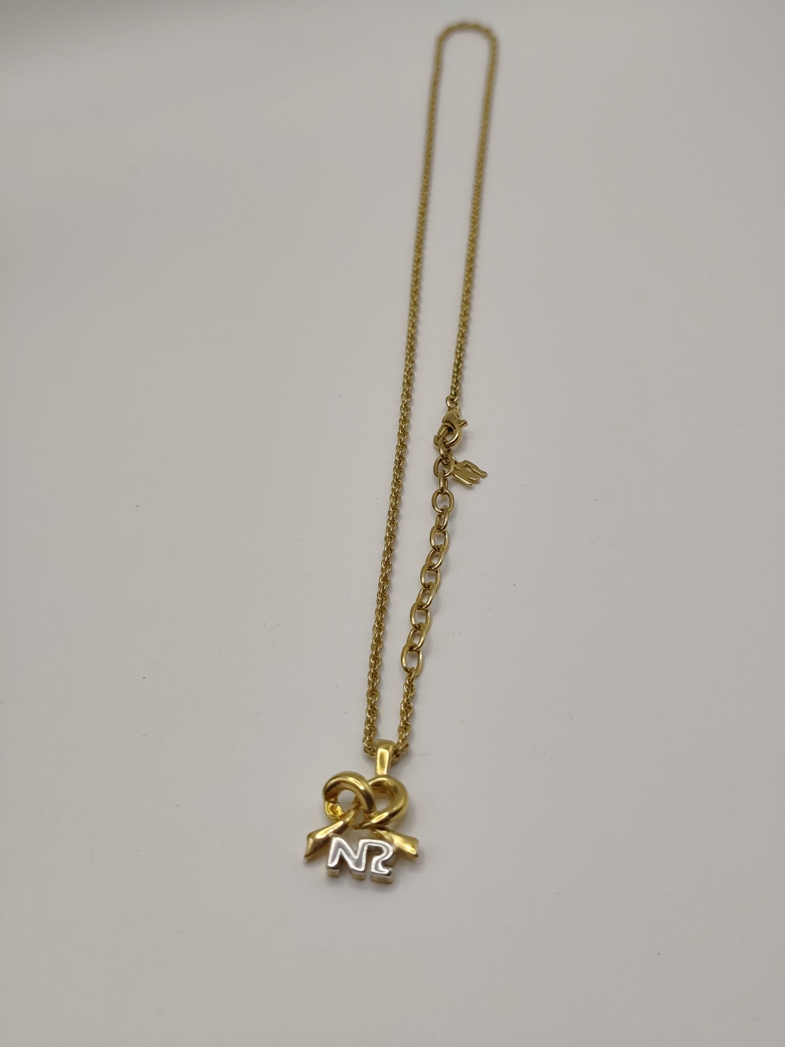 Nina Ricci Gold Tone Ribbon Pendant Necklace with Box image 5