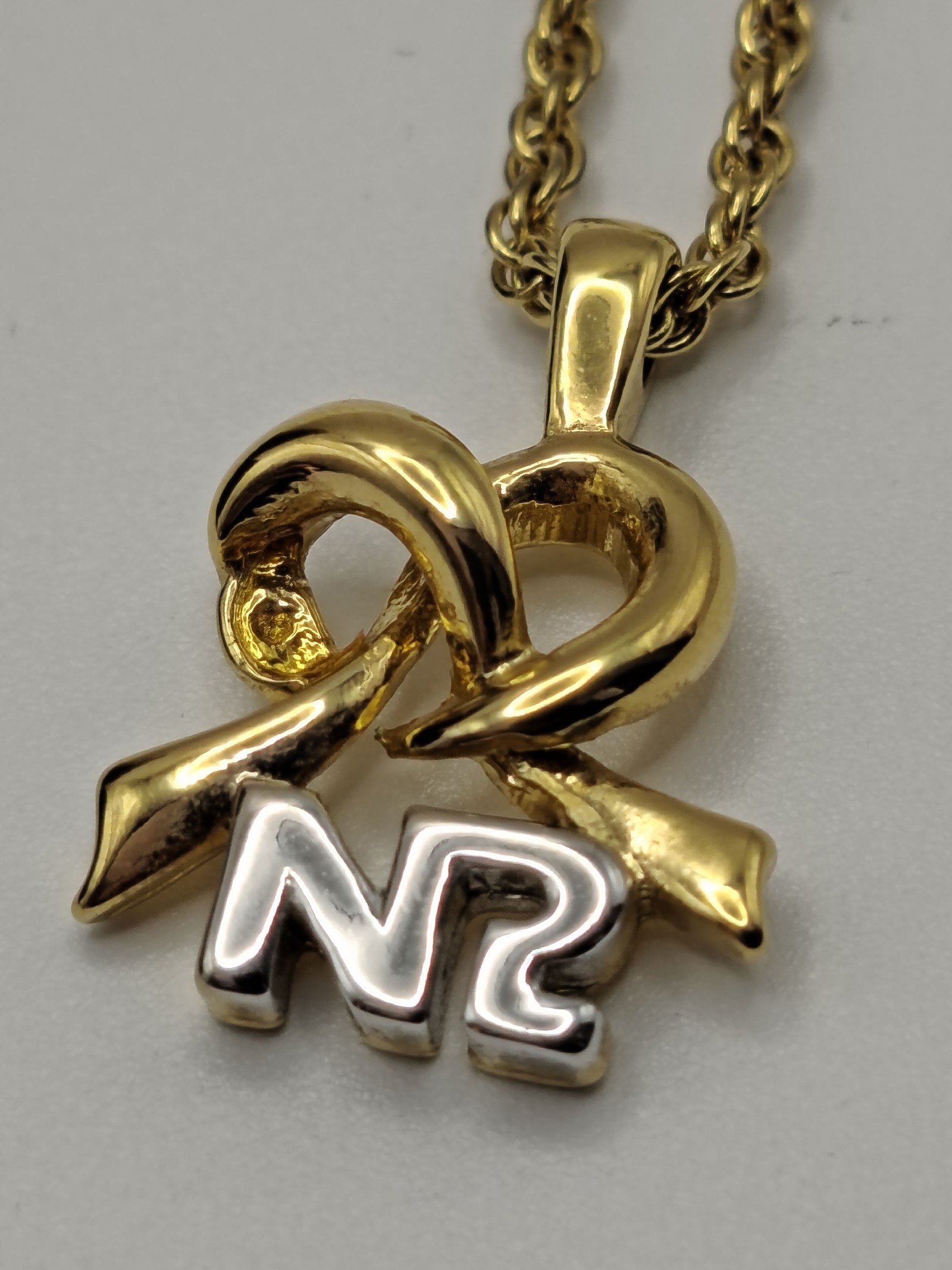 Nina Ricci Gold Tone Ribbon Pendant Necklace with Box image 6