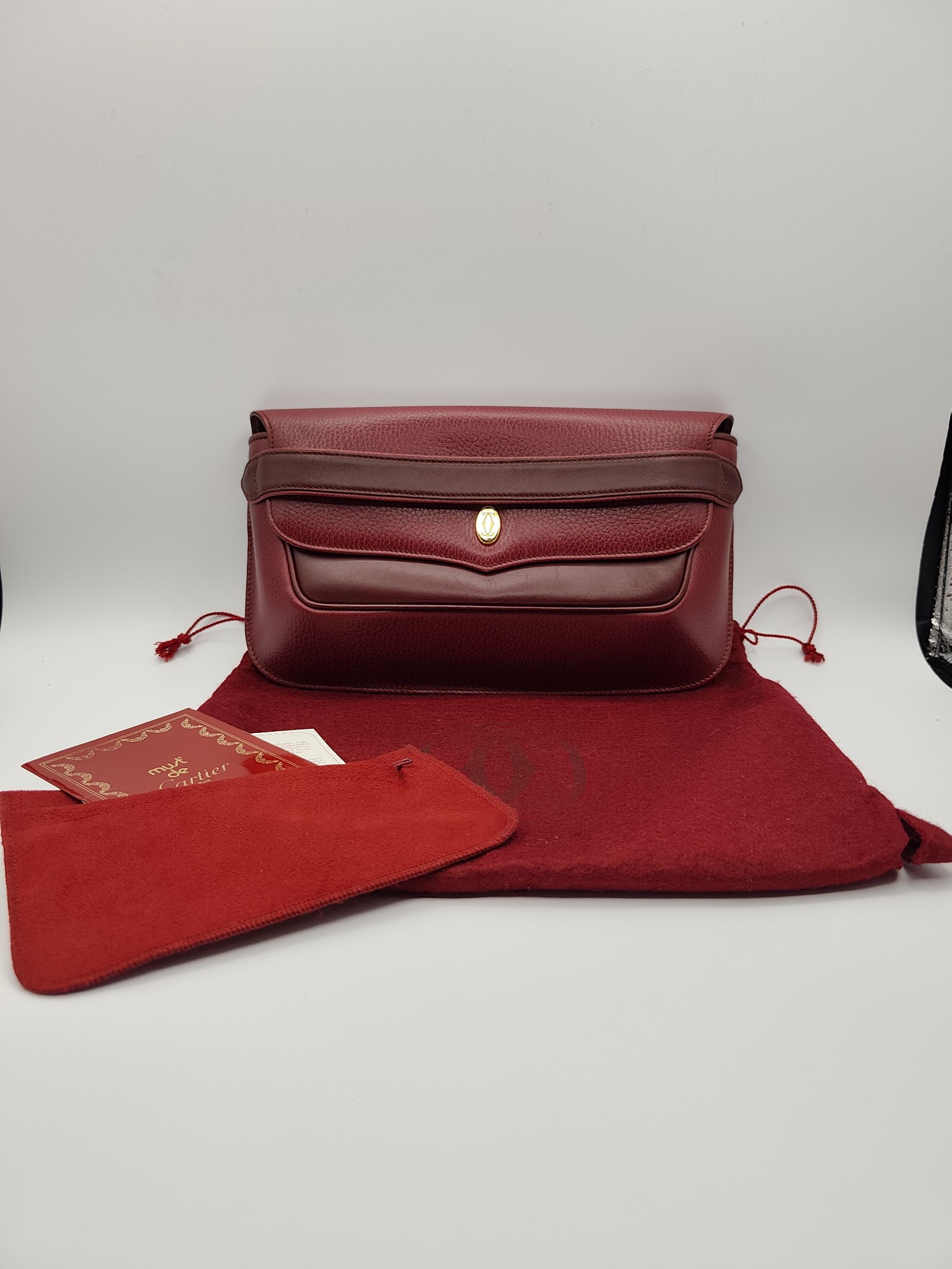 Cartier Women's Burgundy Leather Clutch Bag