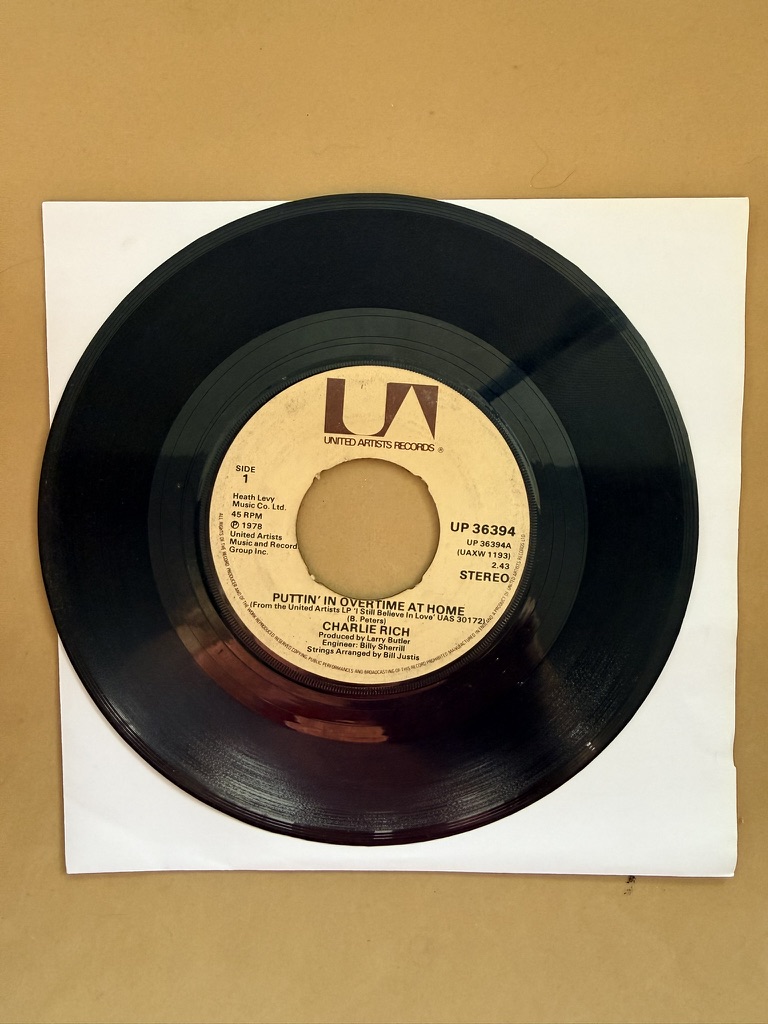 Charlie Rich 1978 United Artists Vinyl 7in Single Puttin' In Overtime At Home / Ghost of Another Man