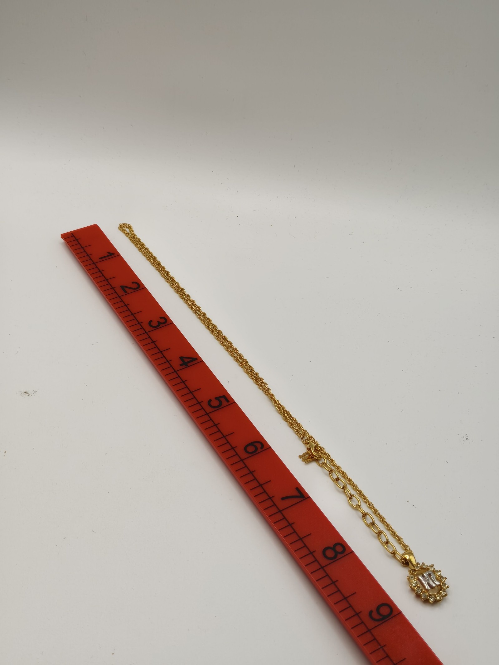 Nina Ricci Gold Tone Necklace with NR Pendant and Clear Stones Other image 6