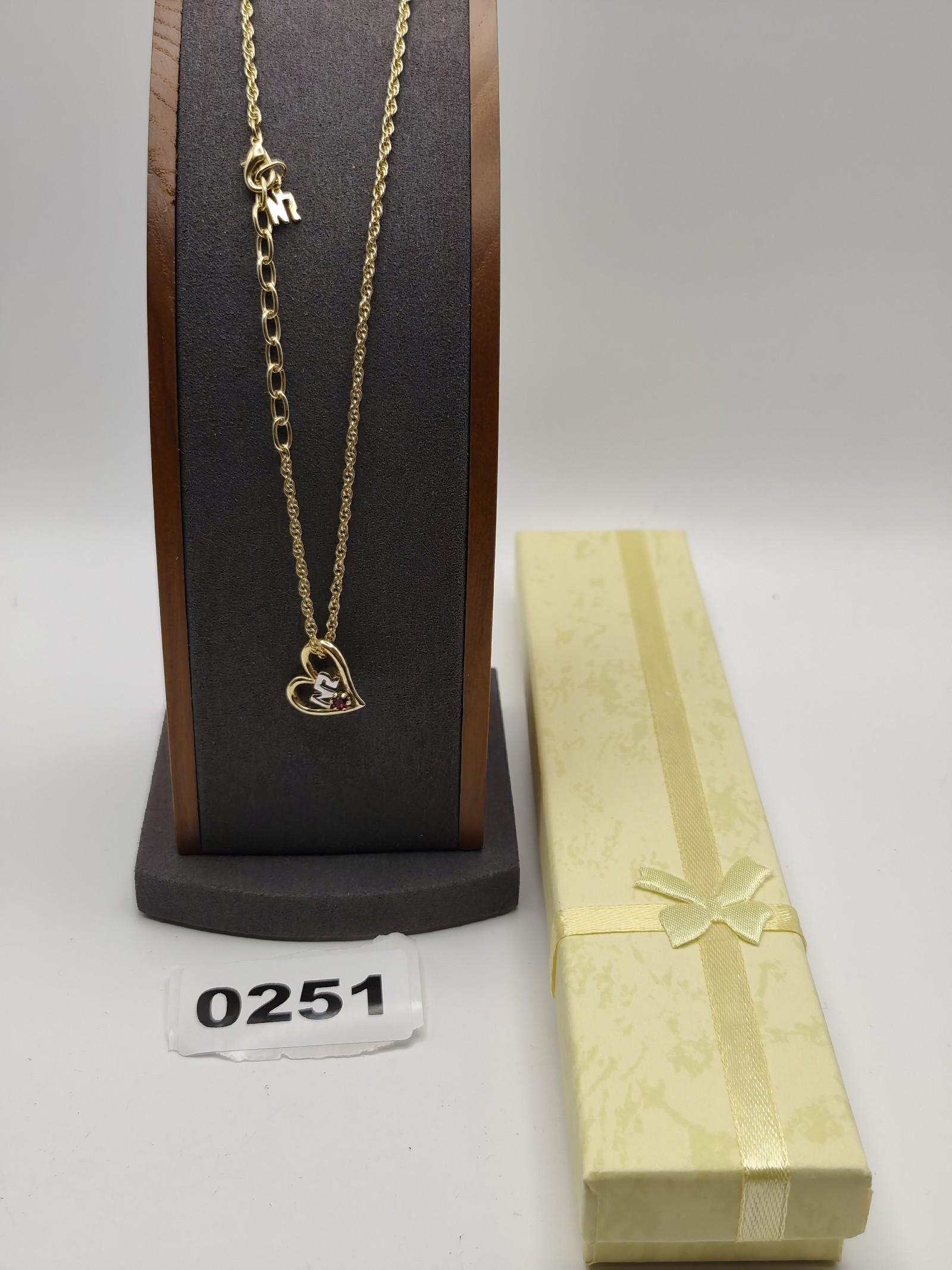 Nina Ricci Gold Plated Heart Pendant Necklace with Red Stone & NR Charm