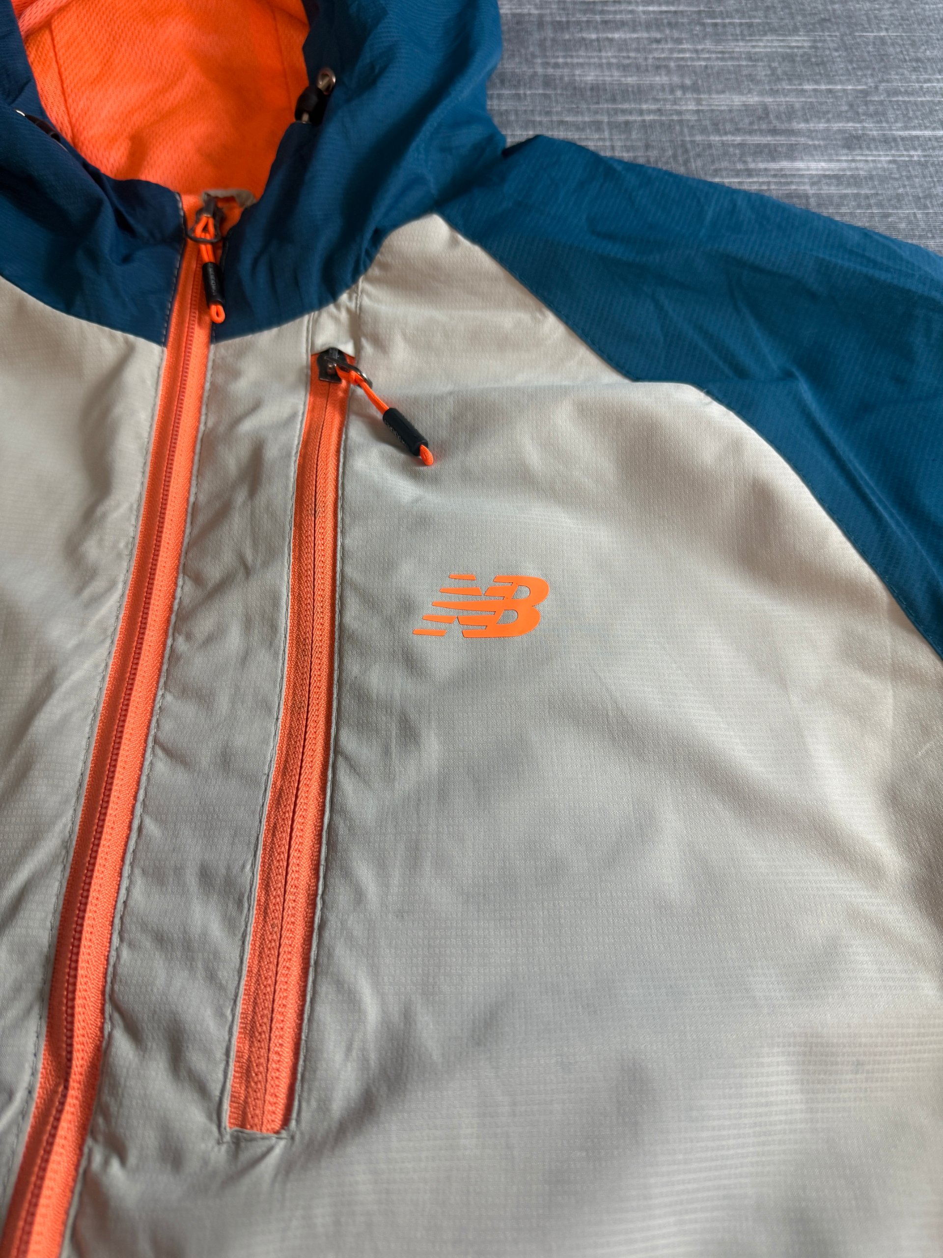 New Balance Men’s Lightweight Windbreaker Jacket Large Blue Beige Orange image 2