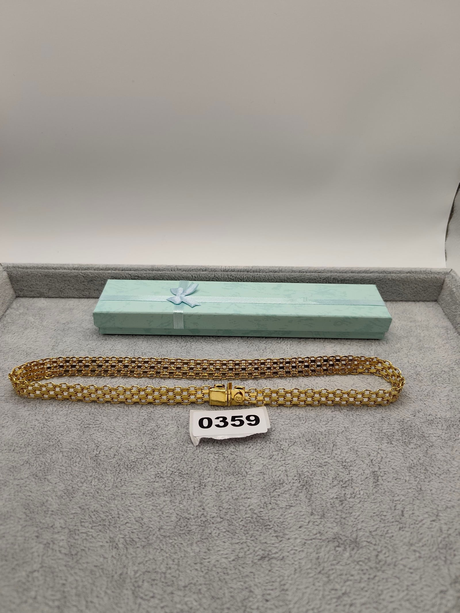 Cosmo Gold Gold tone Bracelet with Box