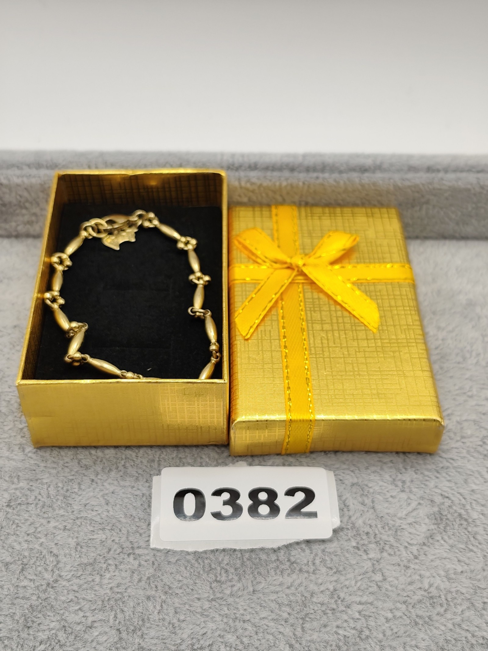 Agatha Gold Tone Women's Charm Bracelet with Dog Logo Pendant Other
