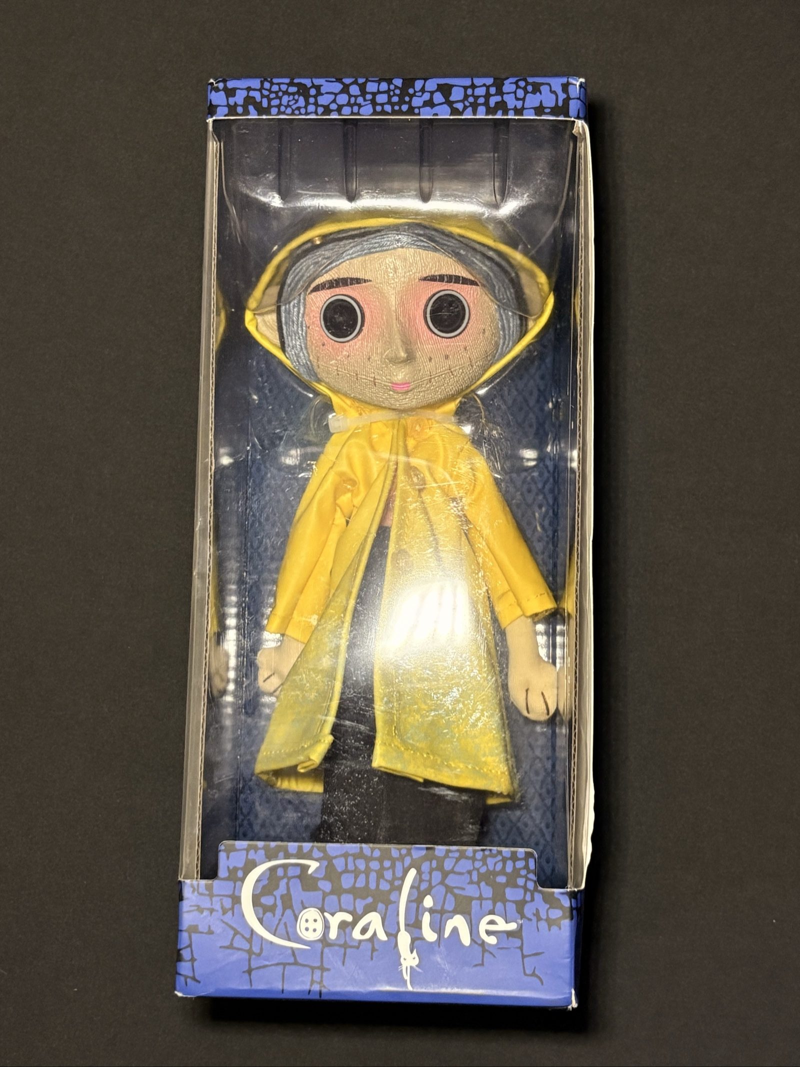 NECA Coraline Yellow Raincoat Doll Prop Replica