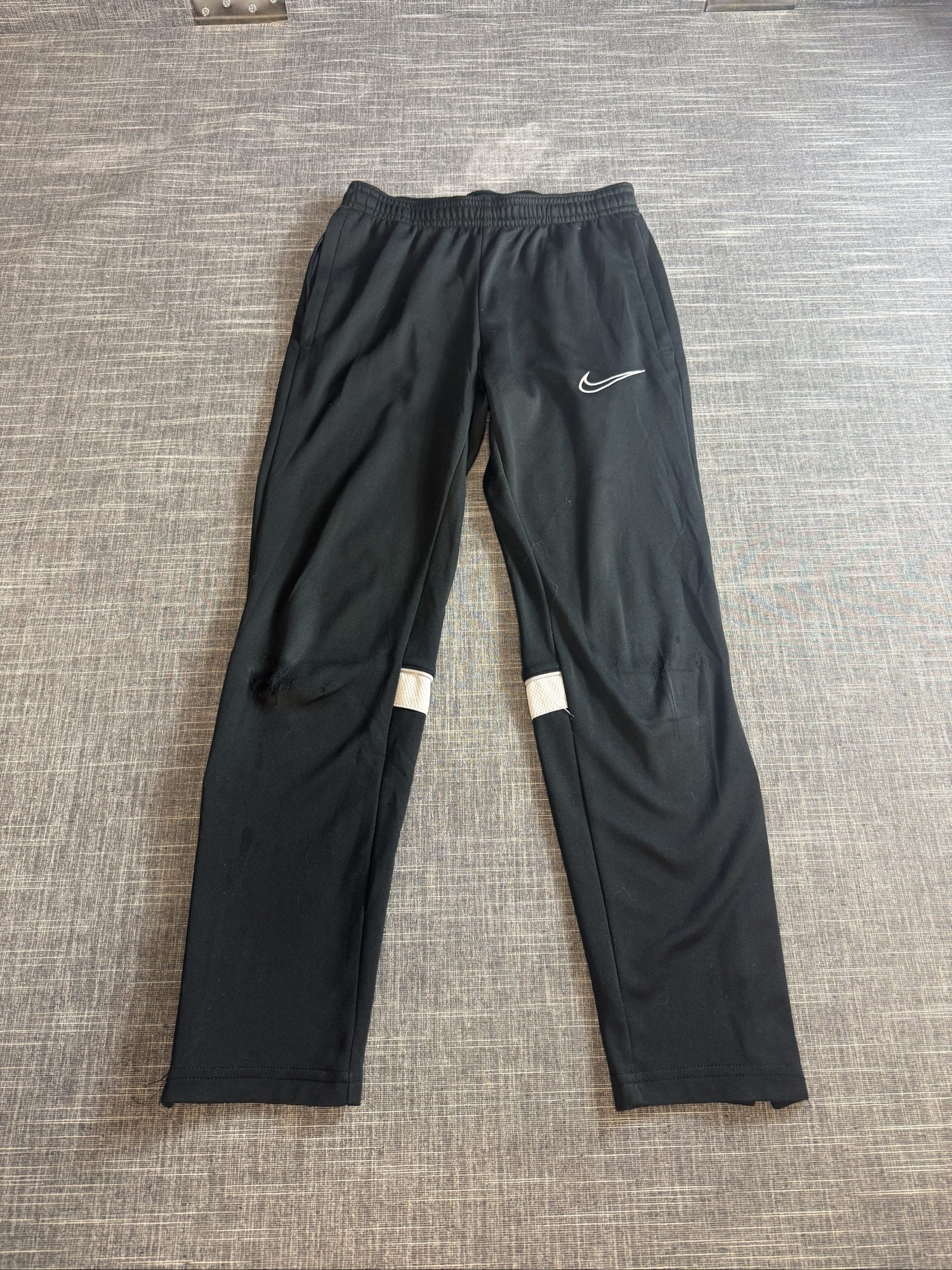 Nike Men's Black Track Pants with White Logo Elastic Waistband image 2