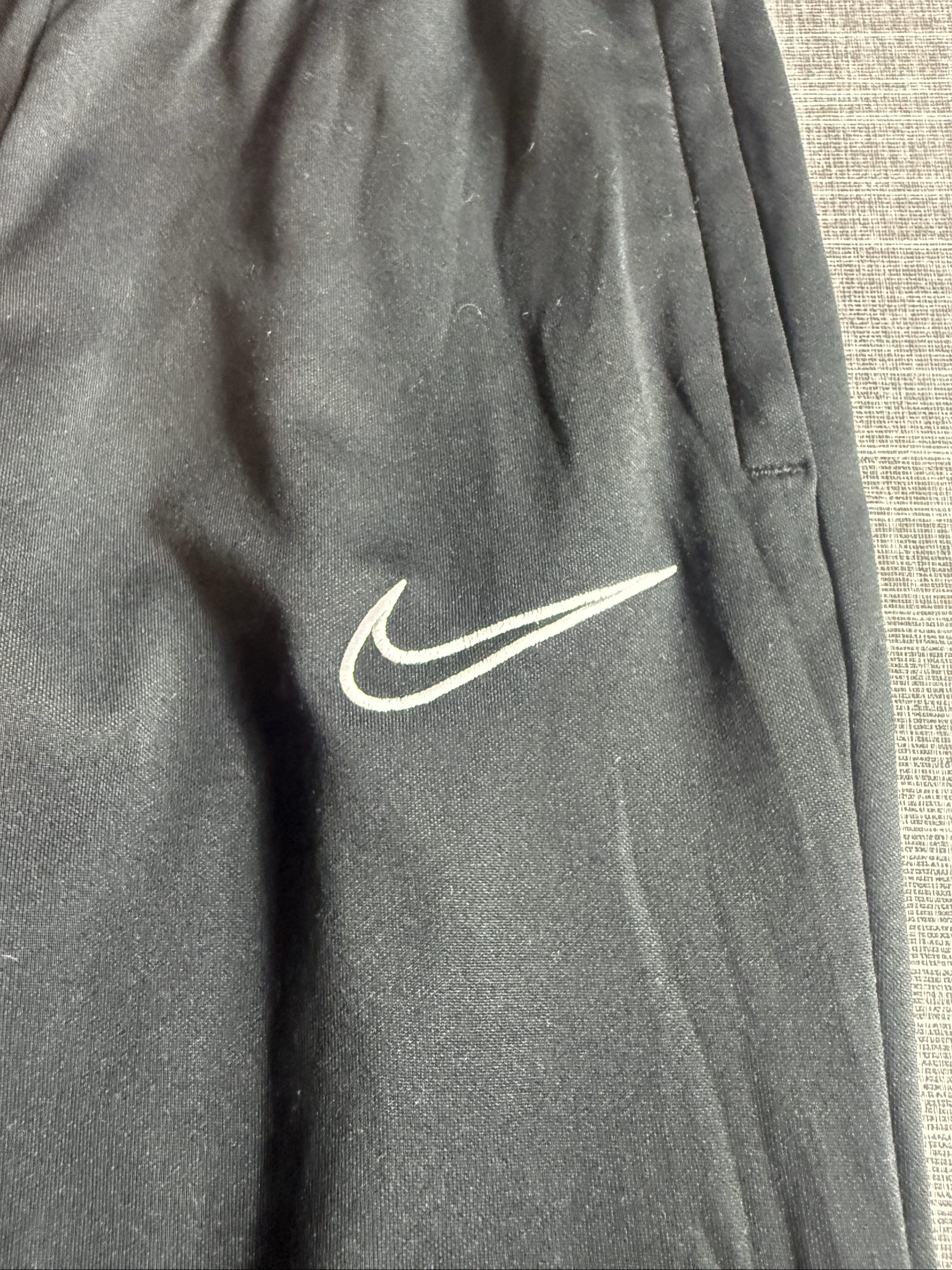 Nike Men's Black Track Pants with White Logo Elastic Waistband image 3