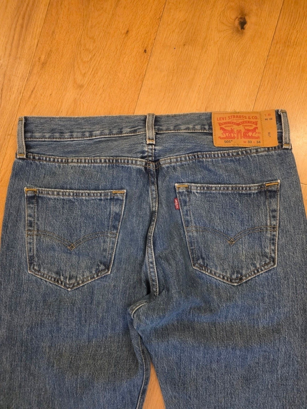 Levi's 501 Blue Denim Jeans 33W 34L Fit image 7