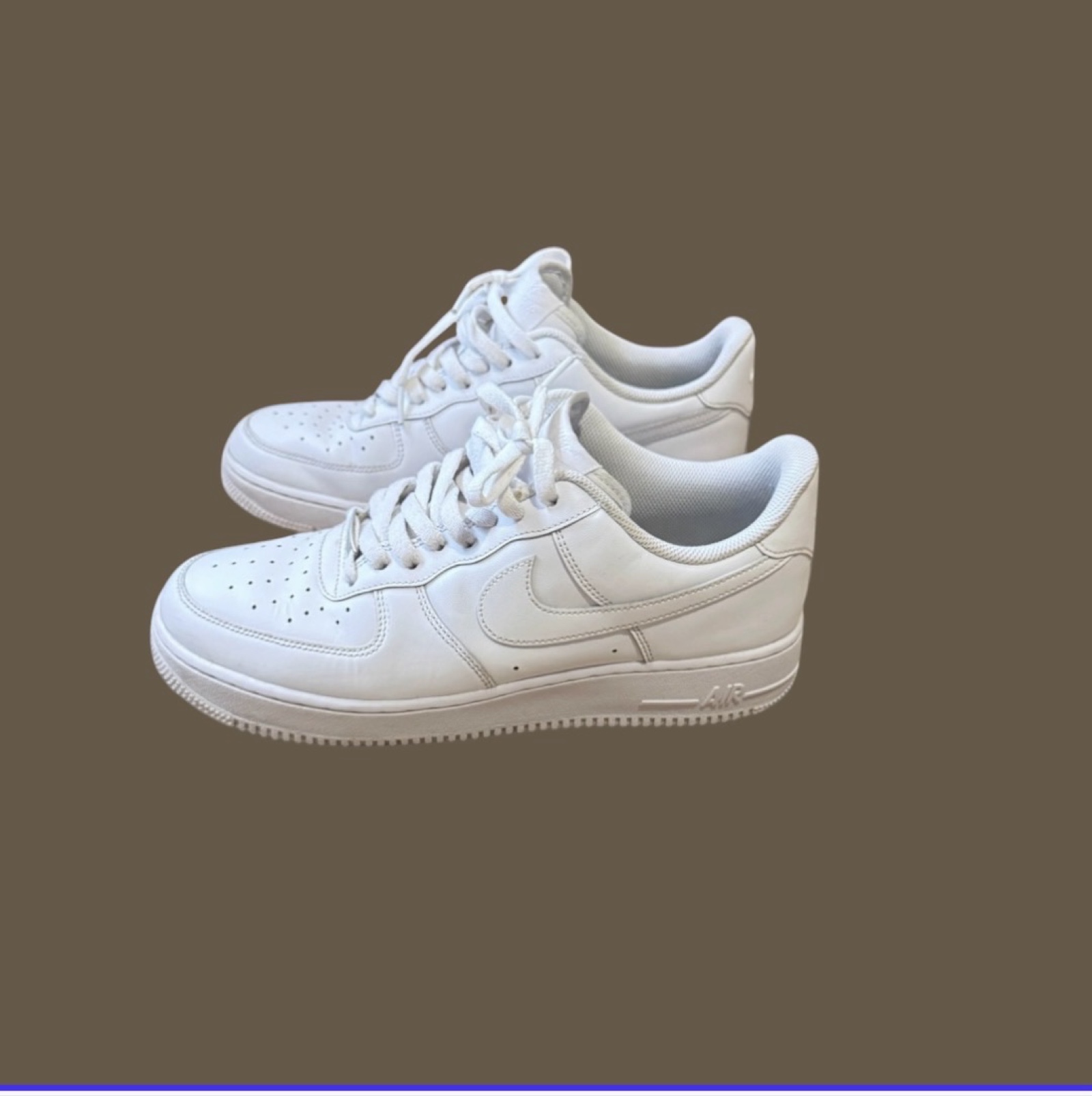 Nike Air Force 1 ‘07 men’s white trainers, style CW2288-111. Details: • Brand: Nike • Style: Low-top, lace-up • Colour: White • Labelled size: UK 8.5 / EU 43 / US 9.5 / CM 27.5 • Materials: Leather upper; textile lining; rubber outsole. • Features: Swoosh logos, perforated toe and padded collar. • Condition: Used, with creasing, scuffs and discolouration. IMPORTANT: Two holes in the inner heel lining of EACH shoe, with frayed fabric and the underlying layer exposed. Please review the close-up damage photos before buying. White appears warmer in some photos due to lighting. Fast UK dispatch. Offers welcome. Please check the photos, labelled size and measurements carefully before purchasing.