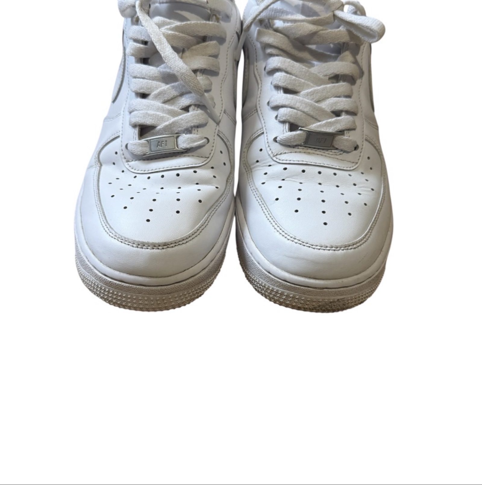 Nike Air Force 1 ‘07 men’s white trainers, style CW2288-111. Details: • Brand: Nike • Style: Low-top, lace-up • Colour: White • Labelled size: UK 8.5 / EU 43 / US 9.5 / CM 27.5 • Materials: Leather upper; textile lining; rubber outsole. • Features: Swoosh logos, perforated toe and padded collar. • Condition: Used, with creasing, scuffs and discolouration. IMPORTANT: Two holes in the inner heel lining of EACH shoe, with frayed fabric and the underlying layer exposed. Please review the close-up damage photos before buying. White appears warmer in some photos due to lighting. Fast UK dispatch. Offers welcome. Please check the photos, labelled size and measurements carefully before purchasing. image 3