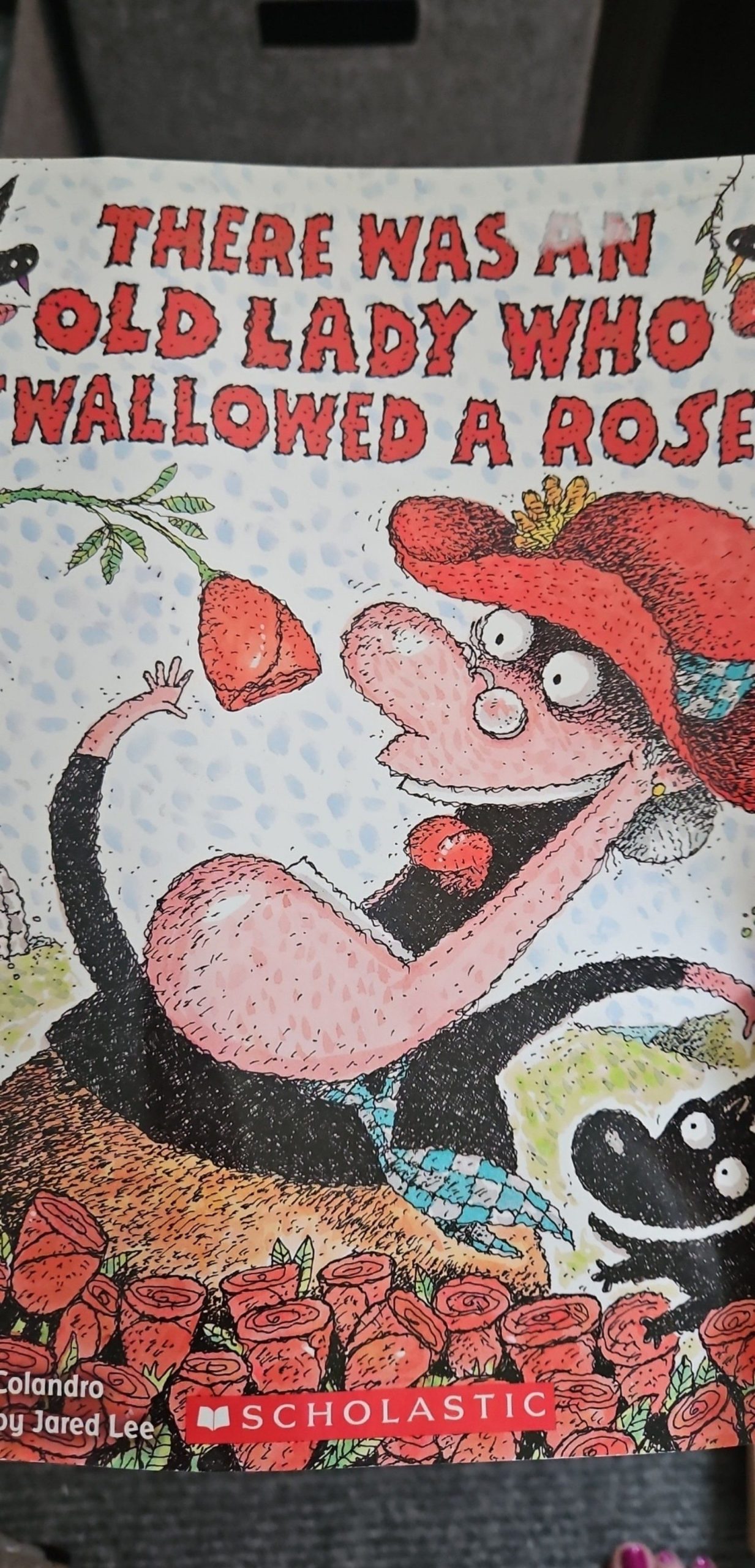 Scholastic There Was an Old Lady Who Swallowed a Rose Children's Book