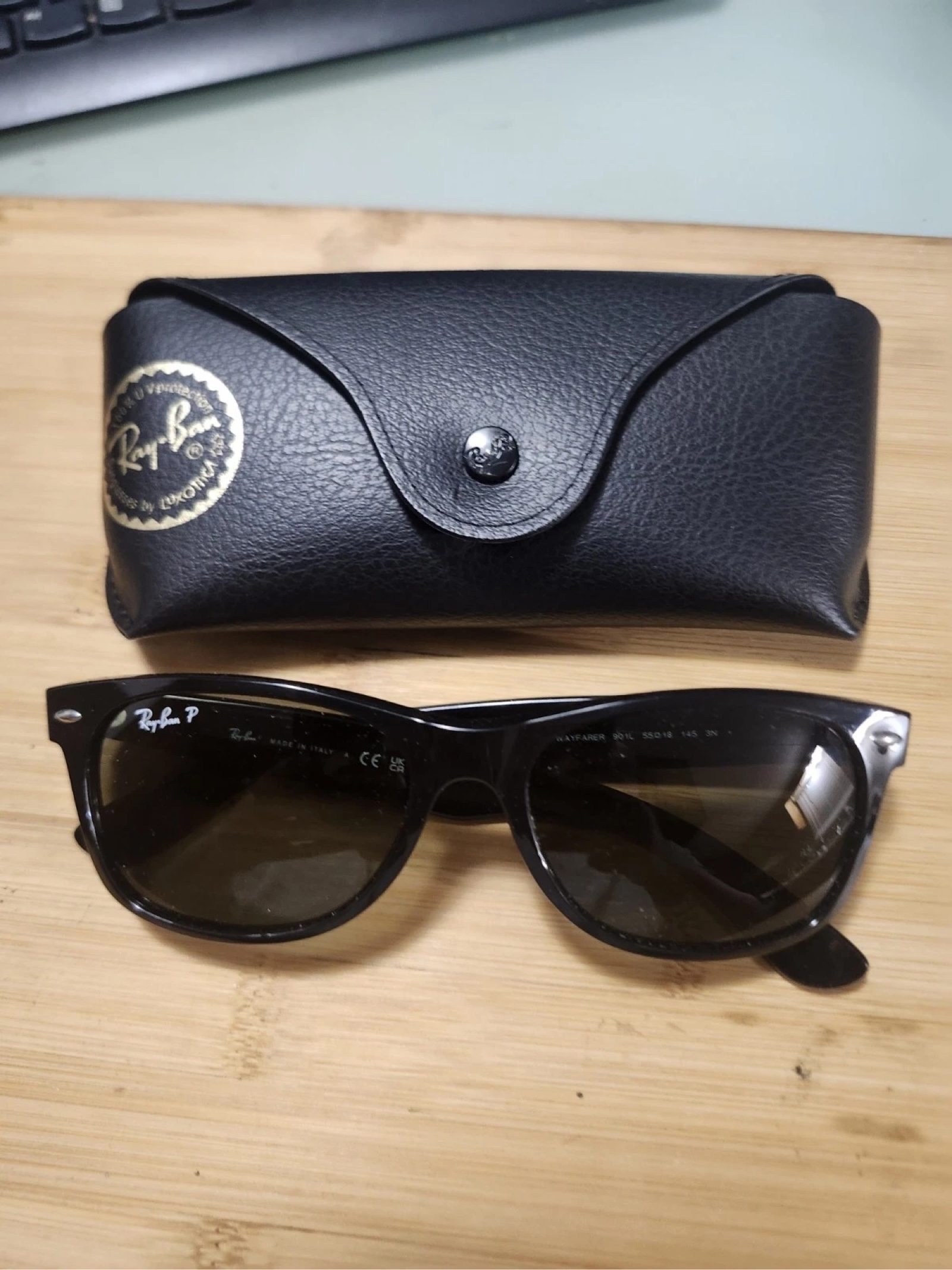 Ray-Ban Black Polarized Wayfarer Sunglasses with Case