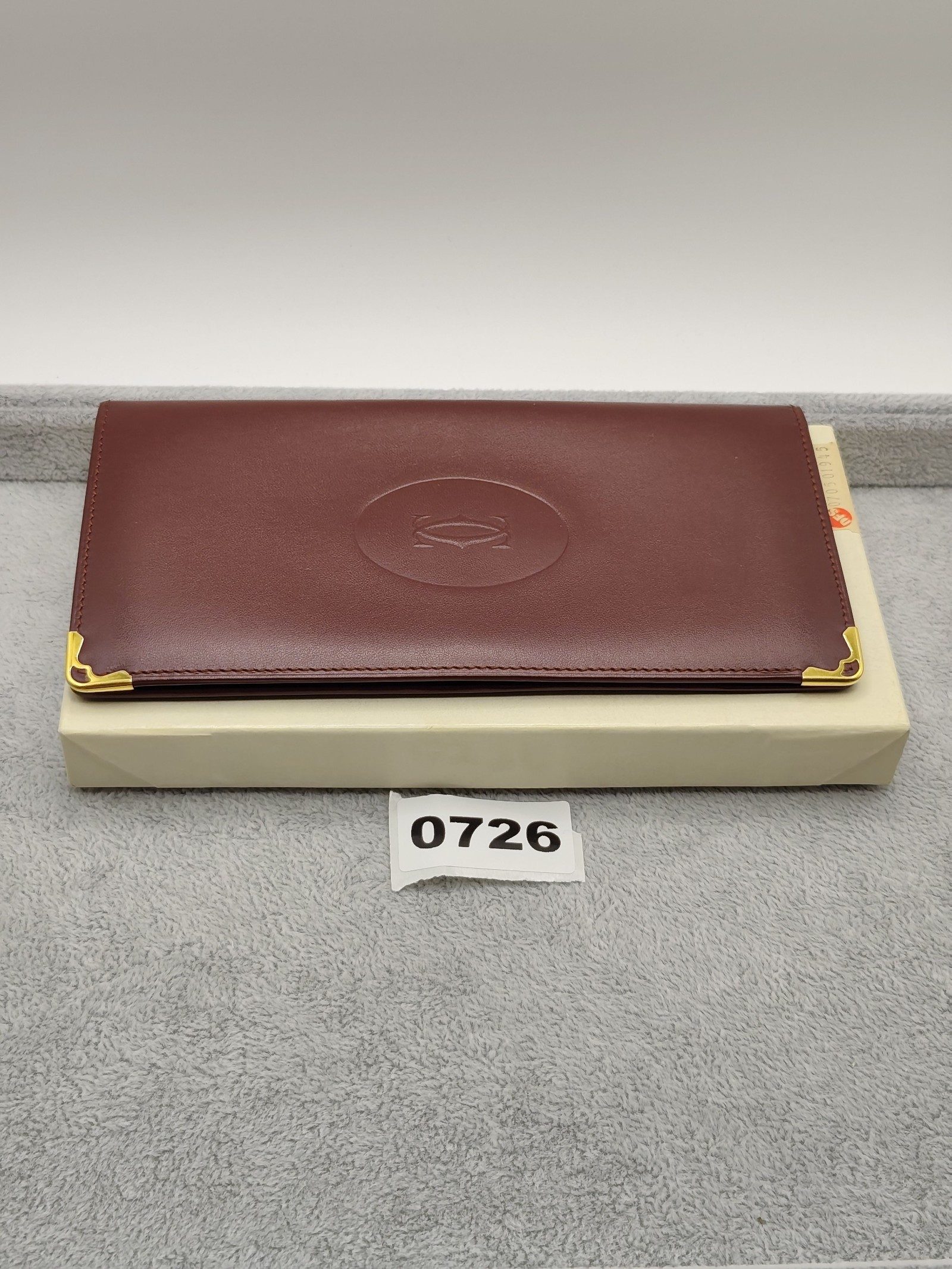 Cartier Burgundy Leather Wallet with Gold Corners Unisex