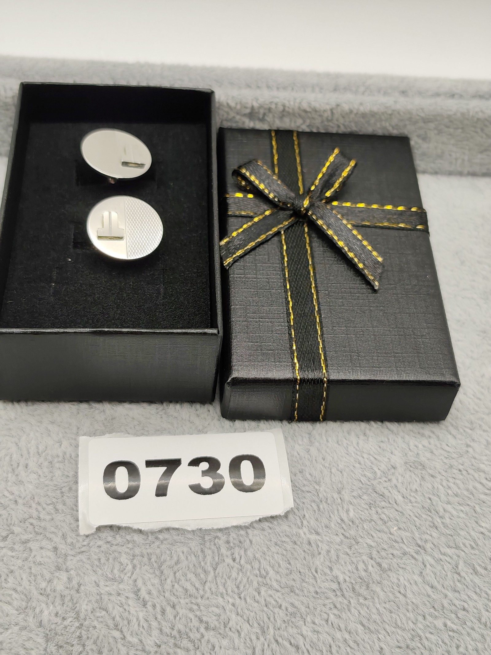 Lanvin Silver Tone Round Cufflinks with T Logo