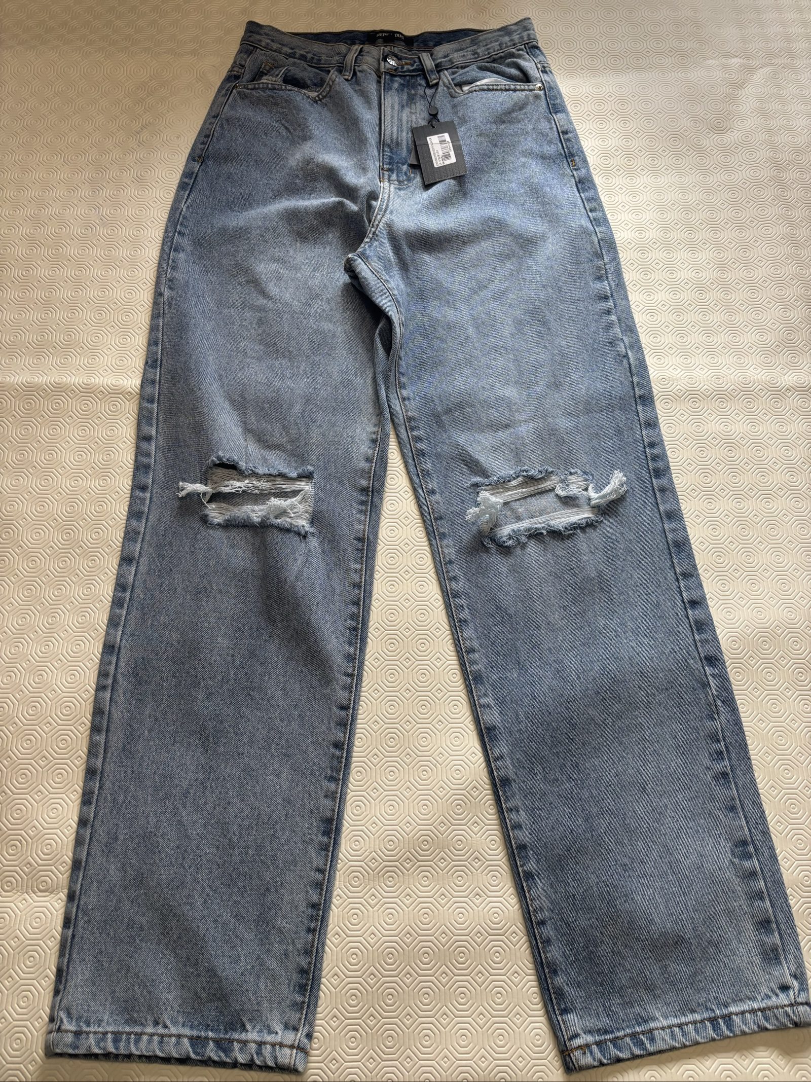 Rebellious Light Blue Distressed Knee Jeans UK 10