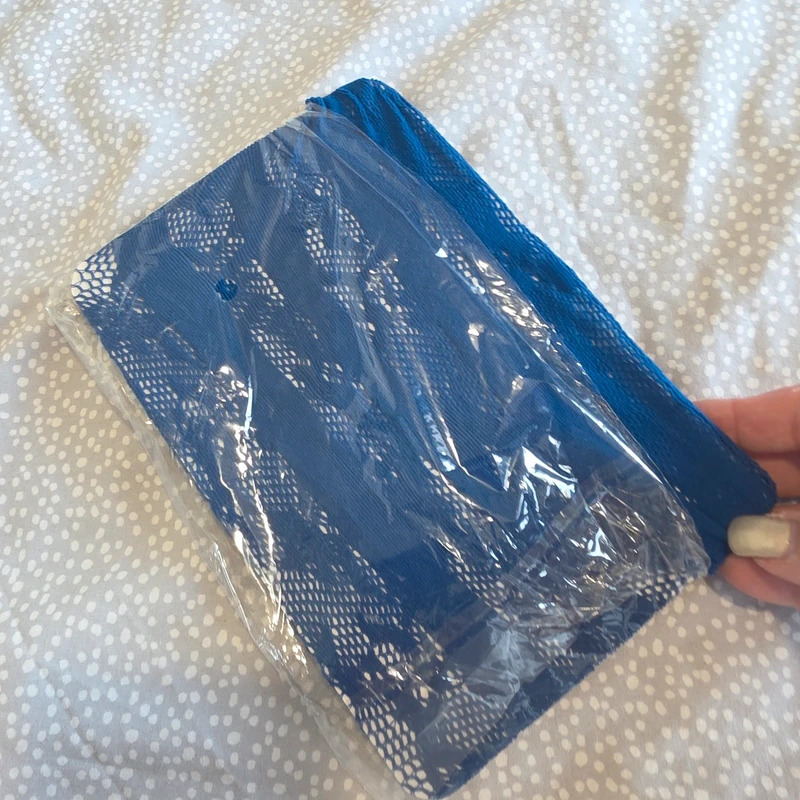 New in bag blue fishnet bodystocking one size 16 plus