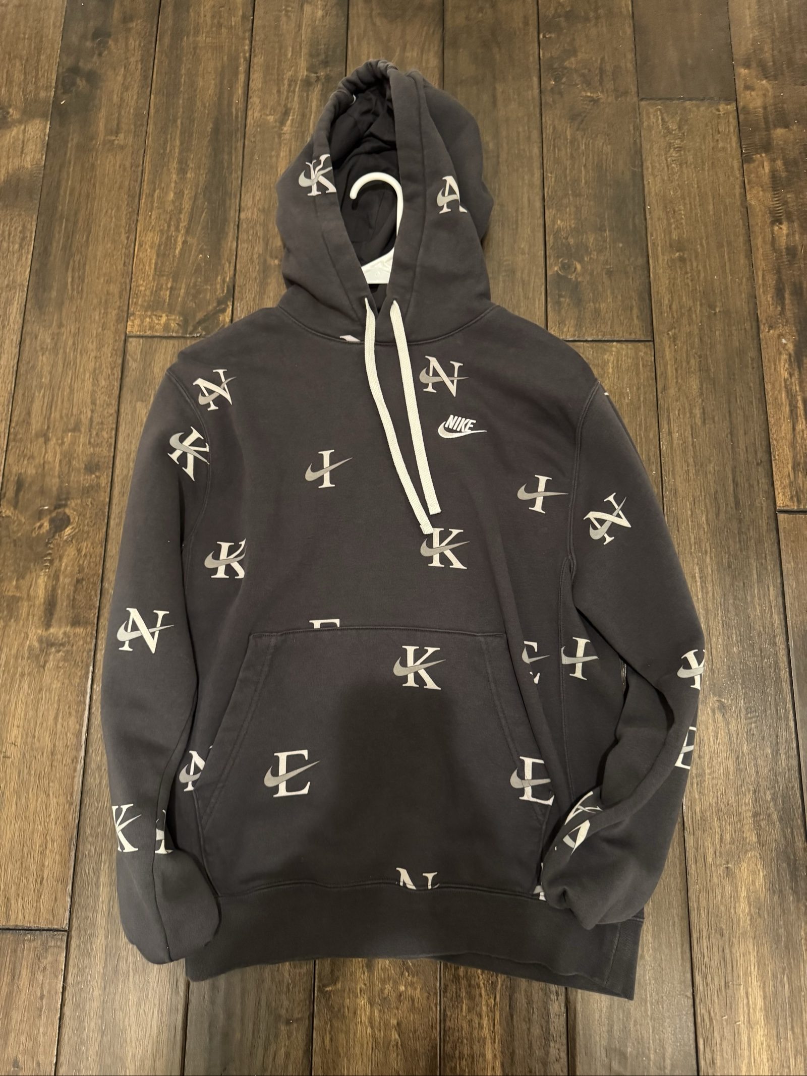 Draft READY Unisex Nike Allover Logo Pullover Hoodie – Dark Gray – Medium
