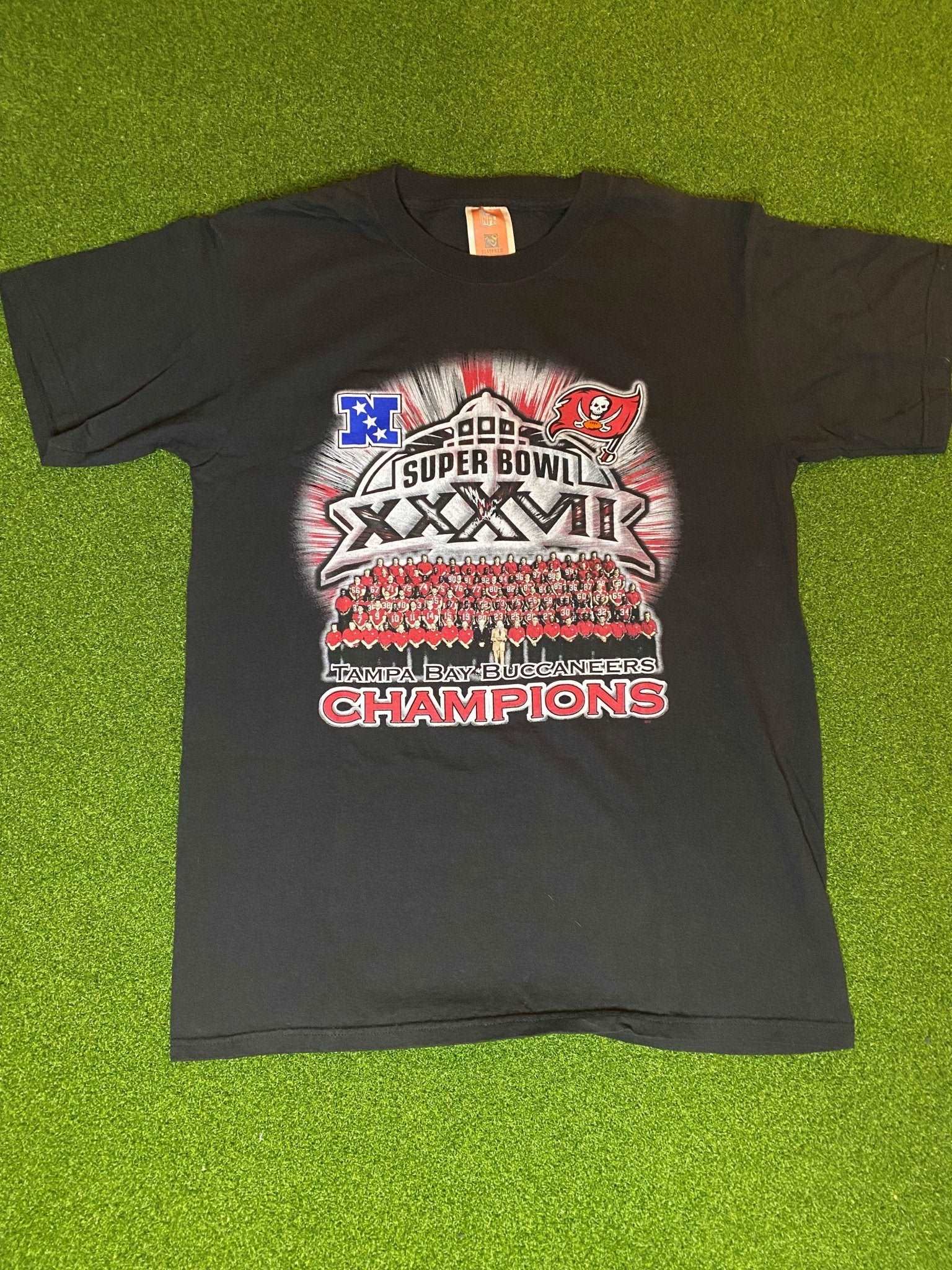2003 Tampa Bay Buccaneers - Super Bowl XXXVII Champ - Double Sided Vintage NFL Tee Shirt (Medium) - Wholesale 80s from Gametime Vintage, United States